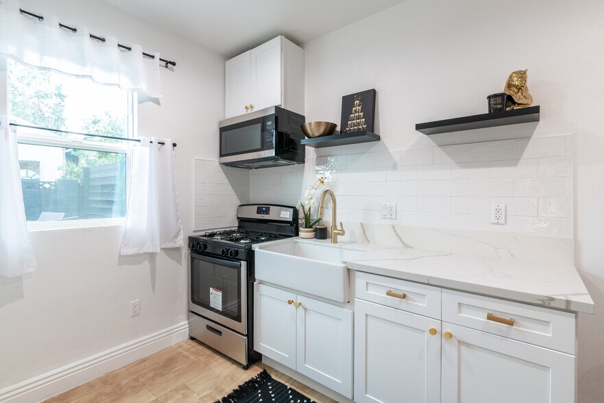 Building Photo - 6065 Amos Ave