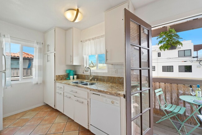 Sink and balcony to south - 709 Agate St