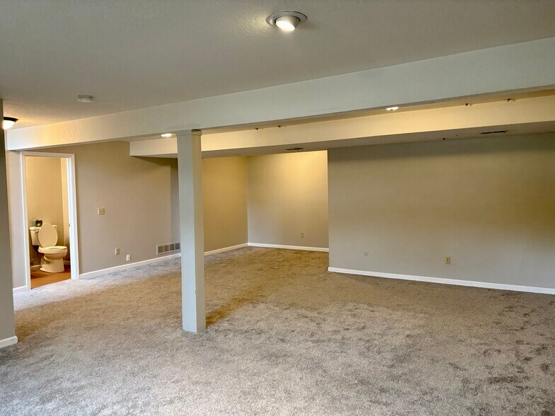 Finished lower level with half bath - 3885 Tam O Shanter Dr N