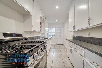 Building Photo - 1628 Normandie-25D