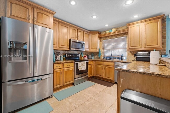 Building Photo - 5821 NW 56th Pl