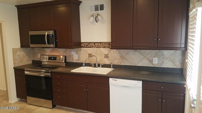 Building Photo - 3129 W Acapulco Ln