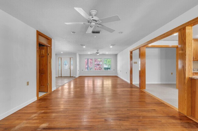 Building Photo - Charming home with large garage & attached...
