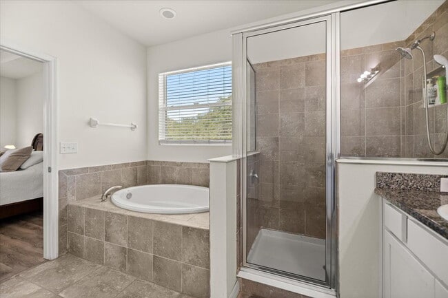 Building Photo - **Spacious 4-Bedroom, 3.5-Bath Home with Private Guest Suite and 3-Car Garage**