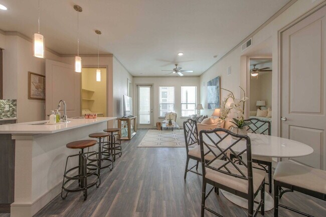 Building Photo - Experience the Art of Fine Apartment Living!