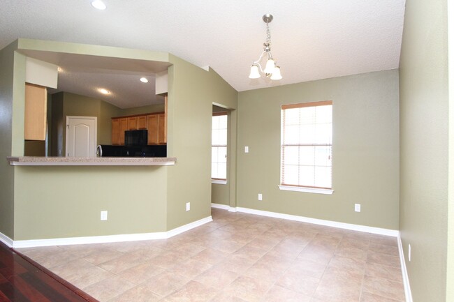 Building Photo - Executive 3-Bedroom Brick Home with Florid...