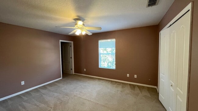Building Photo - Spacious 4/3.5 Pool Home with Water View & 3-Car Garage in Lee Vista Area (close to Lake Nona)