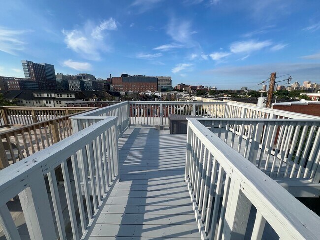 Building Photo - East District 3 BR/3.5 BA End Row Home w-Private Parking