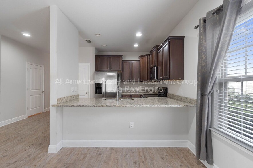 Building Photo - 8827 Little Cormorant Ln