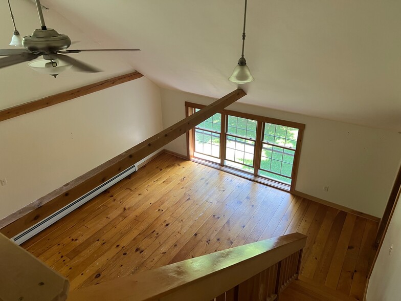 Looking down to living room from top of stairs/third floor - 18 Maple Ave