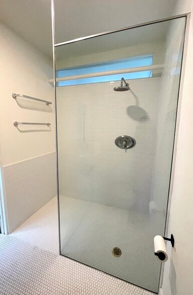 penny and subway tile on floors and walls - 939 Indiana Ave