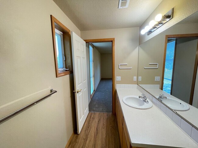 Building Photo - Spacious 4-Bedroom, 2.5-Bath Home with Deck, Fireplace & Updated Kitchen