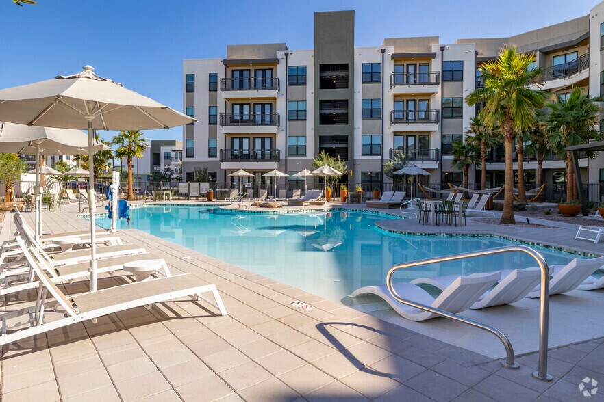 Resort-Style Pool with Beach Entry, Sundeck, and Hammocks - Livano Avondale