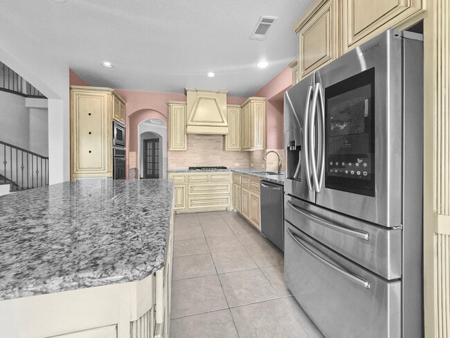 Building Photo - Immaculate 4-Bedroom Home with Luxury Upgr...