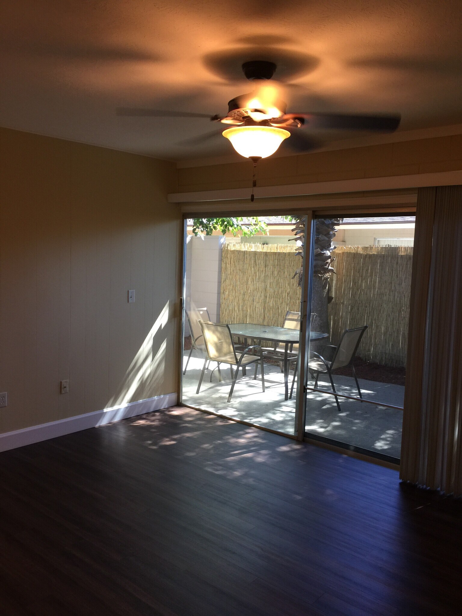 View of private patio from living room - 2241 W Pensacola St