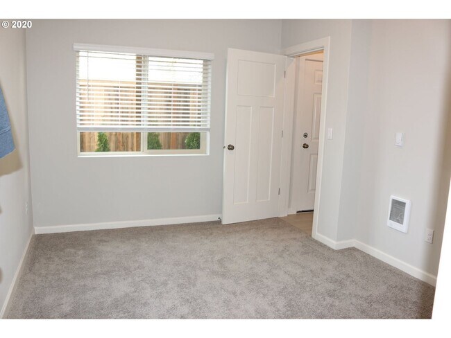 Building Photo - Modern 3-Bedroom Townhome-Style Home with Attached Garage, Private Patio & En-Suite Bathrooms in ...