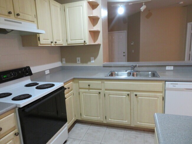 Building Photo - Spacious 4/2 condo in Bella Terra communit...