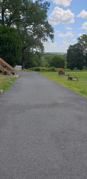 Wide, newly paved driveway leading to your very own parking spaces _ a rare convenience in Boonton - 412 Morris Ave