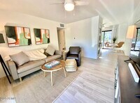 Building Photo - 5811 E Surrey Dr