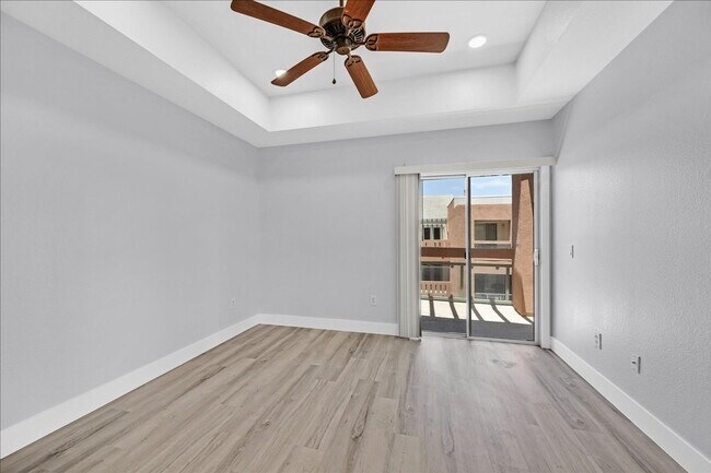 Building Photo - Top level 2 bedroom condo located in guard...