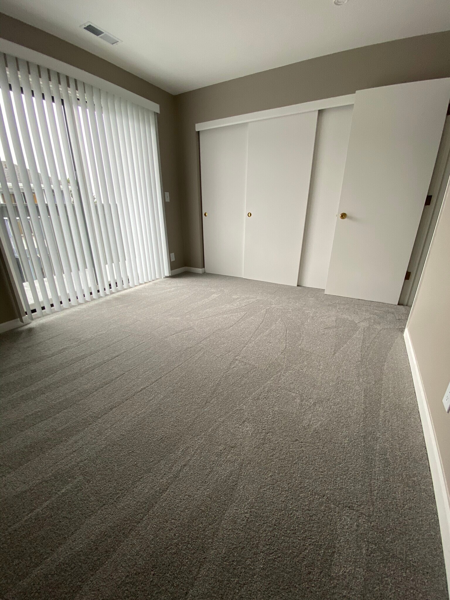 Top west facing bedroom with new carpet - 443 Willow Ave