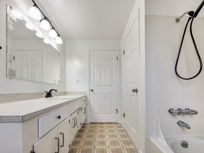 Building Photo - Charming Rambler with Ample Parking and Great Location