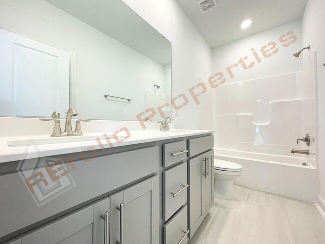 Building Photo - Beautiful Brand New 4 Bedroom, 3 Bathroom ...