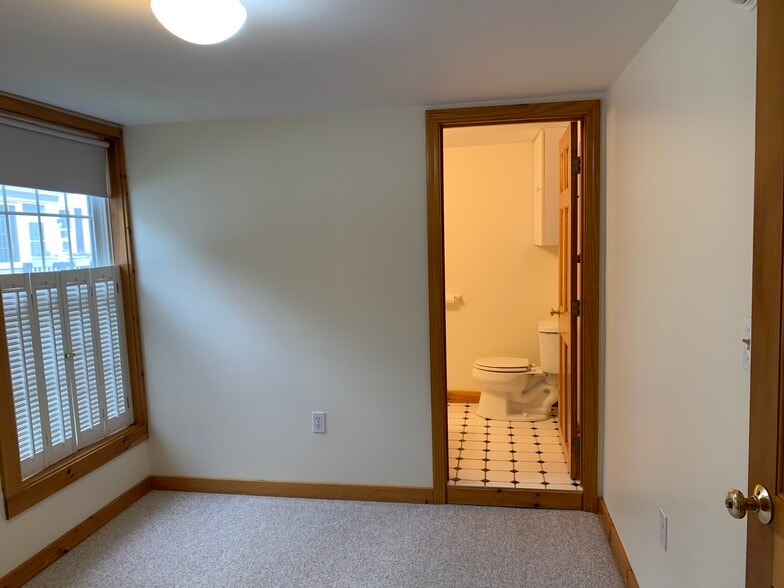 Standing in bedroom looking in to bathroom - 37 Court St