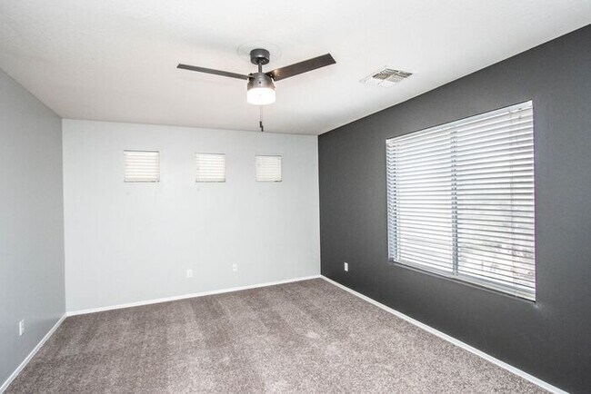 Building Photo - Welcome to this beautiful 4 bedroom, 3 bathroom home in San Tan Valley, AZ.