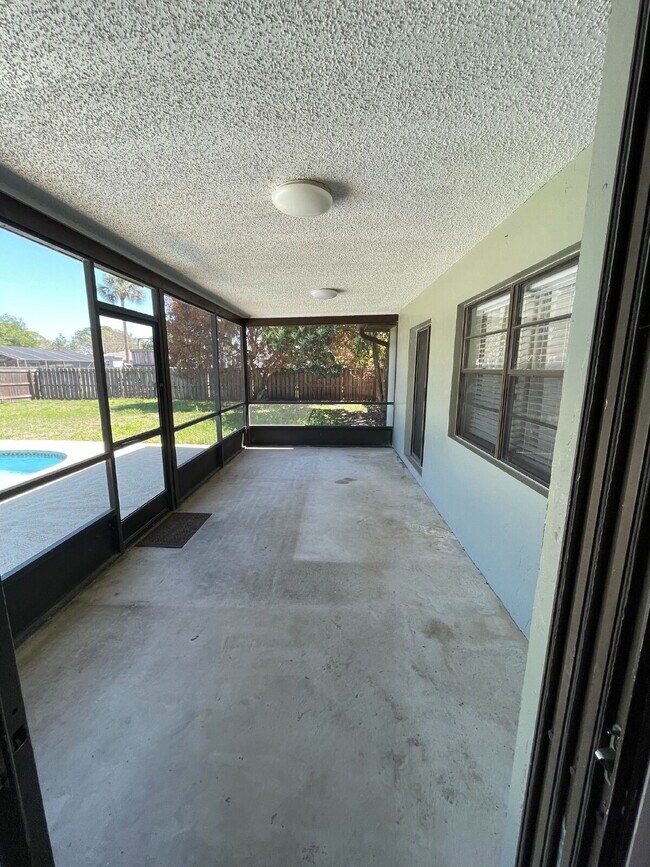 Building Photo - 3 Bedroom Pool Home Available in Palm Bay