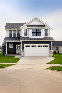 Building Photo - Spacious 4-Bedroom Home with 2-Car Garage & Yard