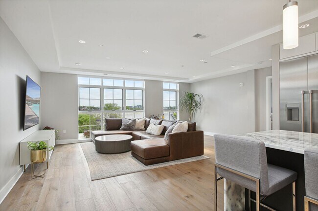 Building Photo - Elegant 2BR at The Adora | 1,500+ SF, Chef’s Kitchen & Garage Parking!