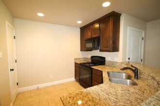 Building Photo - Move In Ready | 3BR/2BA Weatherford Town Home with Granite Countertops, Luxury Plank Floors & App...