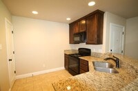 Building Photo - Coming Soon | 3BR/2BA Weatherford Town Home with Granite Countertops, Luxury Plank Floors & Appli...