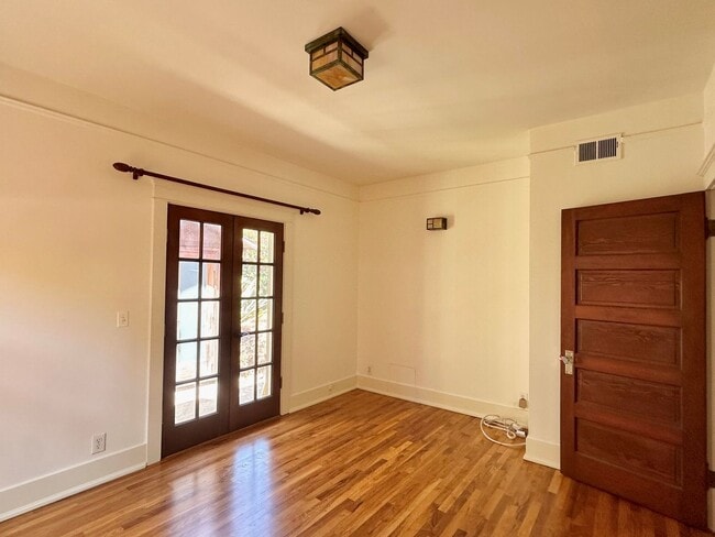 Building Photo - Meticulously Restored 1920s Craftsman on a Private, Hedged Lot | Pet Friendly!