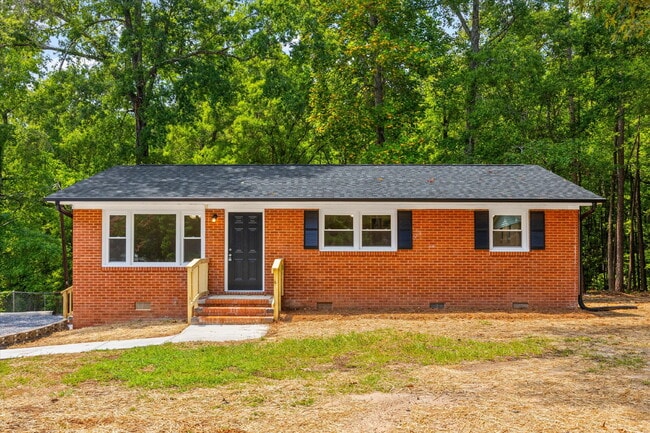 Building Photo - Renovated Brick Ranch with Nature Views + ...