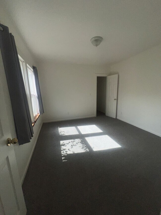 Building Photo - Charming 3-Bedroom, 2-Bath Tri-Level Home with Unfinished Basement