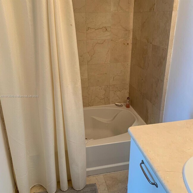 Building Photo - 6515 Collins Ave