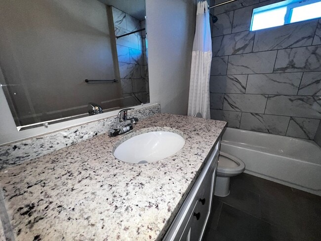 Building Photo - Modern 3BR Townhome w/ Garage, Private Yard & No Carpet – Built 2022