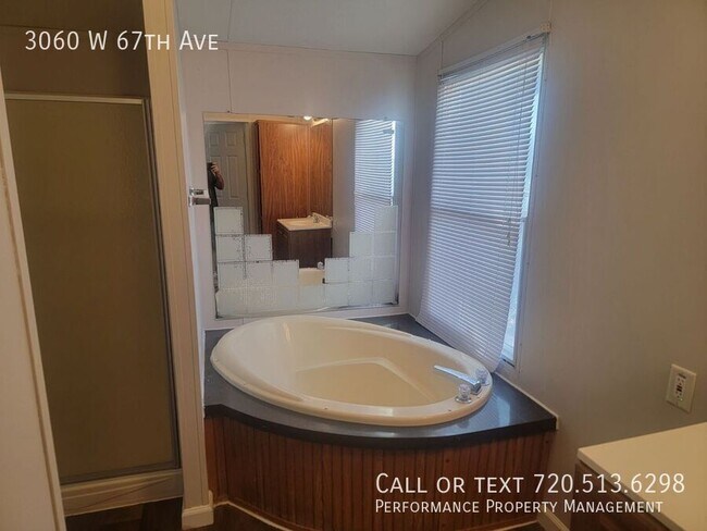 Building Photo - 3060 W 67th Ave