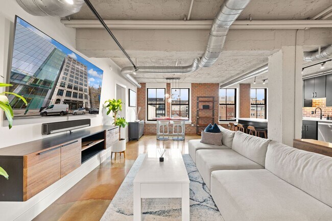 Building Photo - Fully Furnished Designer Loft with Parking & Monument Views!