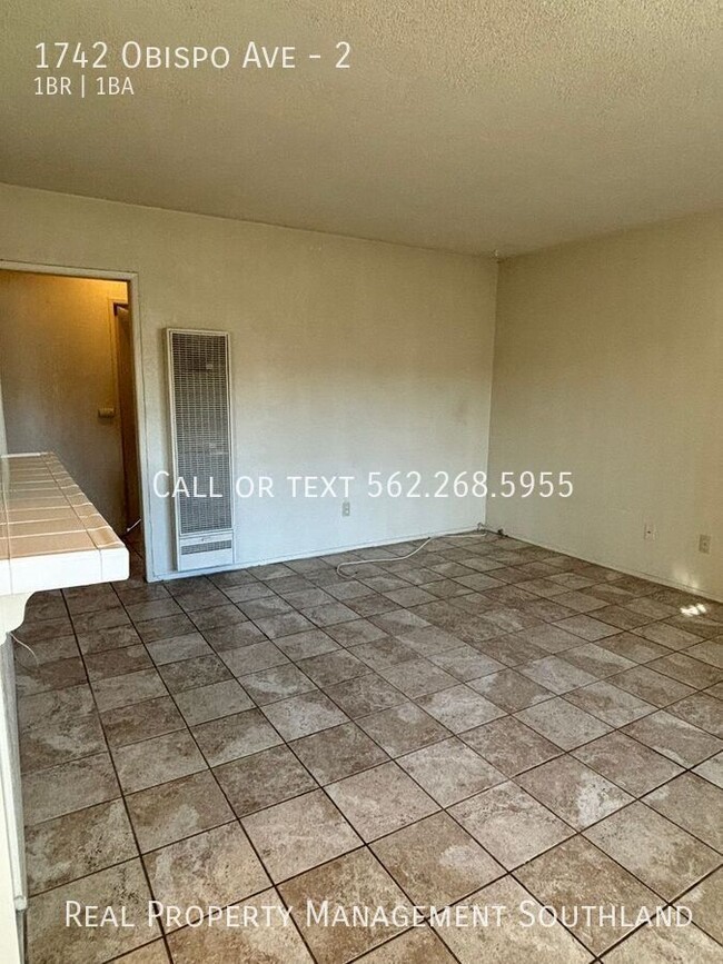 Building Photo - Spacious 1 BD + 1 Bath in gated building i...