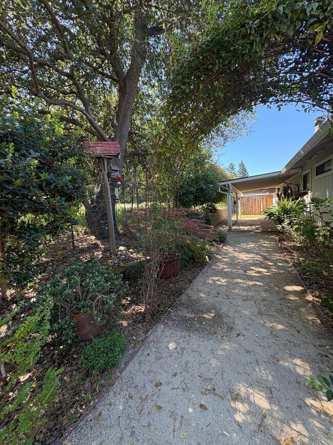 Building Photo - Your Private Escape – Charming Ranch-Style Home with Room to Breathe!