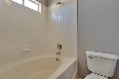Building Photo - Single story 3 bedroom 2 bath home with REFRIGERATED AIR.