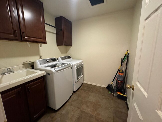 Building Photo - Charming 4-Bedroom Family Home with Hidden Speakeasy! -Lesley Reilly Property