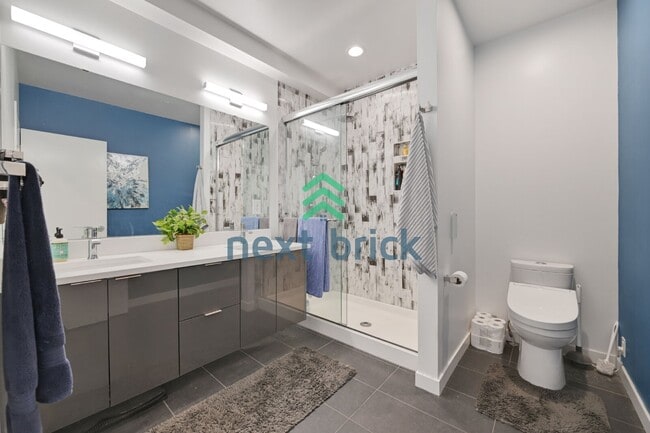 Building Photo - Charming 2-Bedroom Townhouse with 2.5 Baths and Spacious 1,510 Sq Ft in Seattle's Vibrant Neighbo...