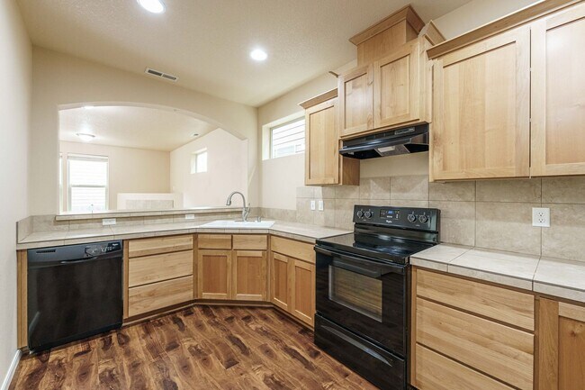 Building Photo - $1000 Year End Savings - Ask Us How! Convenient Location 3 Bedroom 2.5 Bathroom with Fence Back Yard