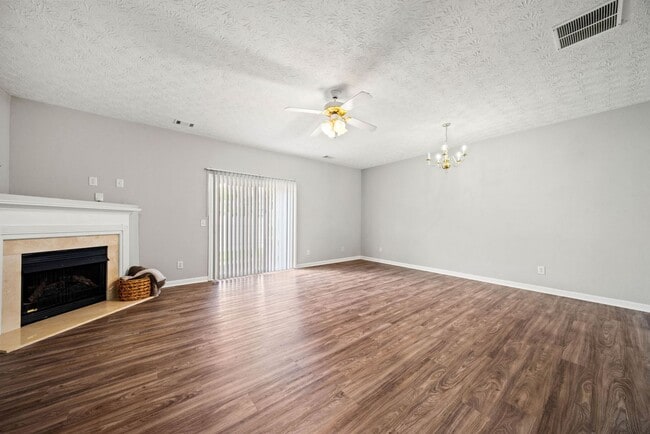 Building Photo - 3-bedroom, 2.5-bath end-unit townhome in the Garrison Square