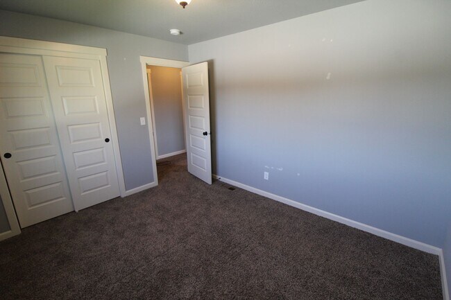 Building Photo - 7020 Dorchuck Rd