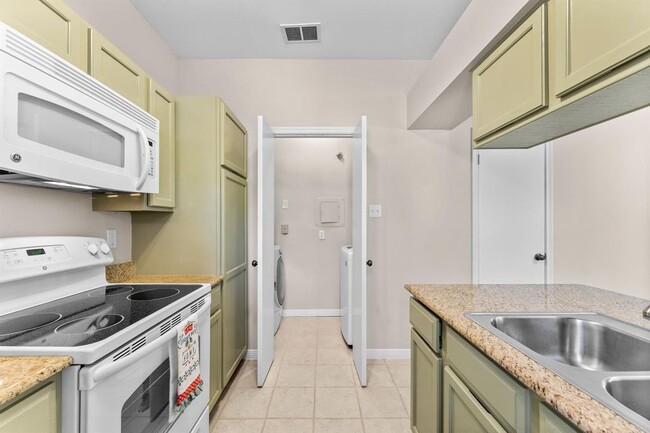 All new appliances including refrigerator, stove/oven, dishwasher, microwave, and WD - 3500 Tangle Brush Dr